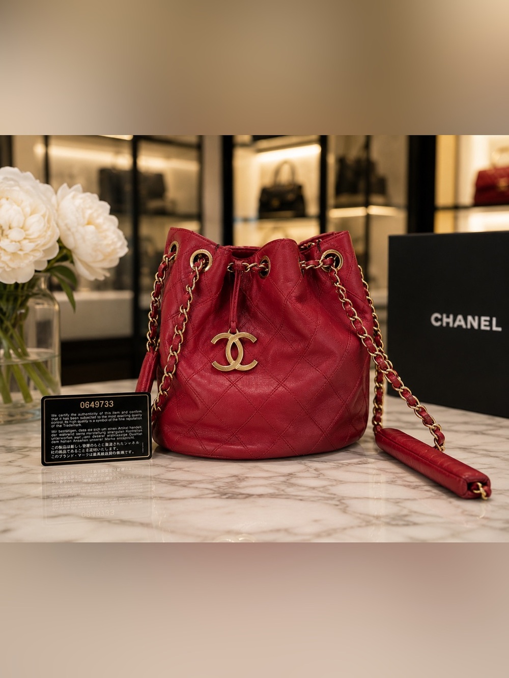 CHANEL Red Quilted Medium Drawstring Bucket Bag